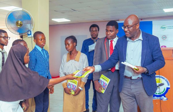 Prof chukwumerije Handing the Climate Edu